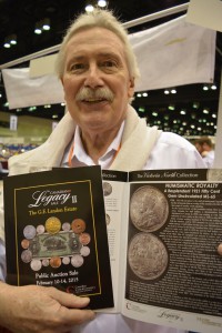 Charles Moore of Moore Numismatic Auctions with an early release copy of The G.F. Landon Estate catalogue, as part of The Canadian Legacy Sale II.