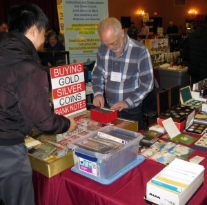 Greg Fedora, of Select Coins, helping a collector.