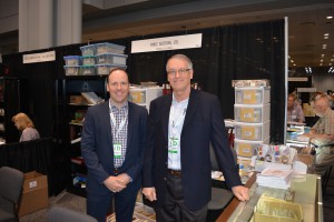 Canadian dealers Chris, left, and Vance Carmichael of Vance Auctions at their booth. 
