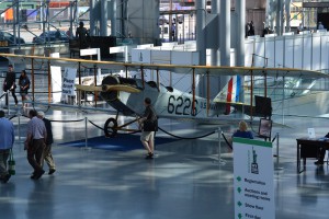 A restored, 100-year-old Curtiss JN-4H, dubbed the Jenny, is on display near the entry area of the World Stamp Show.